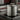 Professional hotel kitchen using stainless steel commercial cookware for large-scale food preparation
