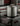 Stainless steel full height cookpot on a induction stove with kitchen background